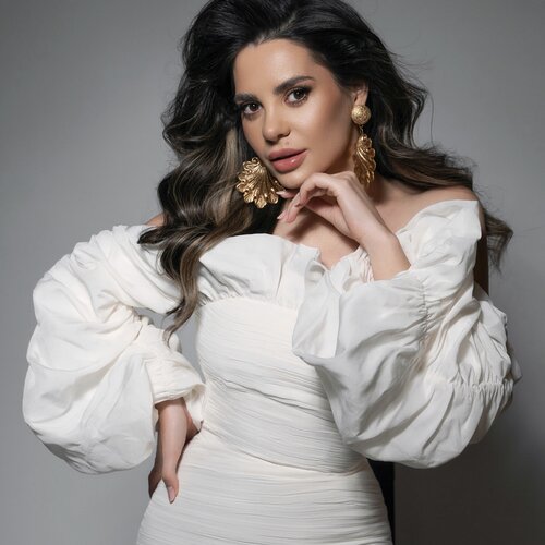 Alina Delcaru in White Dress